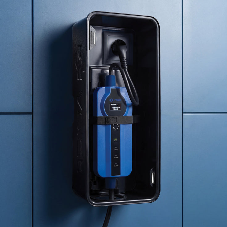 Blue Voldt® portable charger stored inside a wall-mounted lockable cable box