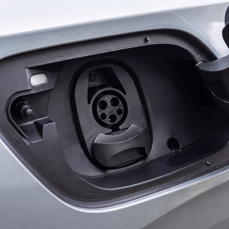 Close-up of the Type 1 charging socket on an electric car